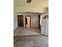 Bright living room featuring tile flooring and an open doorway at 1125 Engman St, Clearwater, FL 33755