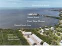Desirable waterfront condos feature a kayak launch, natural beach area, and panoramic bay views of Sunset Beach at 1500 Sunset Rd # C7, Tarpon Springs, FL 34689