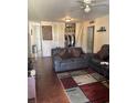 Well-lit living room with hardwood floors and closet, offering a cozy atmosphere at 3206 W Azeele St # 218, Tampa, FL 33609