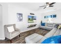 Comfortable living room features stylish furniture, a ceiling fan, and attractive flooring at 511 York Dale Dr, Ruskin, FL 33570