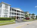 Charming condo building featuring well-maintained landscaping and a welcoming entrance at 6000 20Th N St # 138, St Petersburg, FL 33714