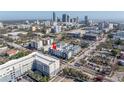 Aerial view showcases the townhome's location with a city skyline backdrop at 883 6Th S Ave, St Petersburg, FL 33701