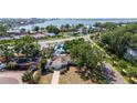 Cozy single-story home near the water with a well-maintained lawn and mature trees at 226 75Th N St, St Petersburg, FL 33710