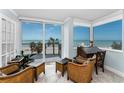 Cozy sitting room with ocean views, comfortable seating, and natural light at 1600 Gulf Blvd # 212, Clearwater Beach, FL 33767