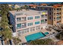 Beautiful three-story beachfront home featuring a private pool, balconies, and rooftop access with stunning ocean views at 3 7Th Ave # 3, Indian Rocks Beach, FL 33785
