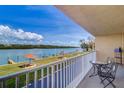 Balcony view of the community docks on the water at 19451 Gulf Blvd # 211, Indian Shores, FL 33785