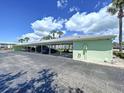 Assigned covered parking space with room for multiple cars at this condo community at 4799 Coquina Key Se Dr, St Petersburg, FL 33705