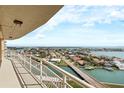 Enjoy panoramic water views from this condo balcony overlooking the bay and neighboring waterfront homes at 4900 Brittany S Dr # 1414, St Petersburg, FL 33715