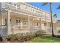 Spacious home with a covered lanai, offering seamless indoor-outdoor living and elegant architectural features at 6106 Marbella Blvd, Apollo Beach, FL 33572