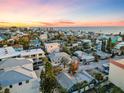 Coastal neighborhood showcasing single-Gathering homes with ocean views and lush landscaping at 150 95Th Ave, Treasure Island, FL 33706