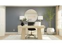 Stylish home office with a round mirror, modern lamps, and a potted plant for a serene workspace at 3584 Silent Gardens Cv, Wesley Chapel, FL 33543