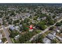 Aerial view of a neighborhood with mature trees near water at 627 38Th Ne Ave, St Petersburg, FL 33704