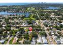Scenic aerial view of a neighborhood near a lake and cityscape at 627 38Th Ne Ave, St Petersburg, FL 33704