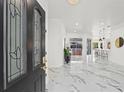 Bright foyer featuring a view of the open floor plan, including the modern kitchen and access to the lanai at 1608 Ledgestone Dr, Brandon, FL 33511