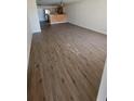 Spacious living room with lovely wood flooring throughout at 11411 Pike Ct # 6, New Port Richey, FL 34654