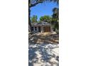 Charming single-story home with new brick driveway and updated front entry door at 304 4Th Sw Ave, Largo, FL 33770