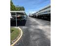 Clean and well-maintained outdoor parking area with covered carports for residents of this condominium community at 4715 Bay Ne St # 235, St Petersburg, FL 33703
