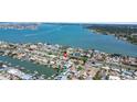 Stunning aerial view showcasing the property's location near the water, offering picturesque waterfront living at 7919 Causeway S Blvd, St Petersburg, FL 33707