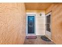 Inviting entrance with a decorative wreath and tile flooring at 101 Dogwood Cir, Seminole, FL 33777