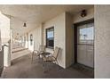Hallway with seating area offers a cozy spot for residents to relax or socialize, enhancing community living at 19029 Us Highway 19 N # 26-204, Clearwater, FL 33764