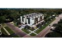 Modern townhome exterior showcasing clean lines, neutral tones, and manicured landscaping at 2112 4Th S St, St Petersburg, FL 33705
