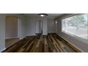 Spacious living room featuring hardwood flooring, neutral walls, and great natural light at 4331 Fairfield S Ave, St Petersburg, FL 33711