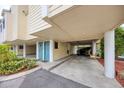 Covered parking area providing convenient access to the unit's entrance at 1500 Sunset Rd # F8, Tarpon Springs, FL 34689