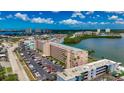 Expansive aerial view showcasing the beautiful coastline, marina, and the surrounding cityscape at 1847 Shore S Dr # 204, South Pasadena, FL 33707