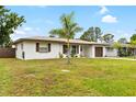 Well-maintained single-story home with a green lawn and inviting curb appeal at 416 Graham Dr, Clearwater, FL 33765