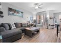 Comfortable living room featuring modern decor, a plush couch, and an inviting atmosphere with lots of light at 1810 E Palm Ave # 5114, Tampa, FL 33605