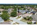 Aerial view of the neighborhood showcasing the home's location within the community at 24405 Summer Wind Ct, Lutz, FL 33559