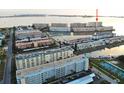 Scenic aerial shot of waterfront condos, boat docks, and meticulously maintained landscaping at 6060 Shore S Blvd # 200, Gulfport, FL 33707