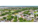 Community aerial view featuring ponds, trees, and well-maintained homes at 12508 Evington Point Dr, Riverview, FL 33579