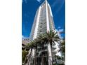Stunning exterior of a high-rise condo building featuring modern architecture and a wall of glass balconies at 175 1St S St # 2005, St Petersburg, FL 33701