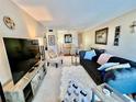 Inviting living room with comfortable seating, stylish decor, and a bright, open feel at 2469 Franciscan Dr # 53, Clearwater, FL 33763