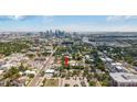 An aerial view of the property showing its location near downtown with cityscape and waterfront views at 105 W Columbus Dr, Tampa, FL 33602
