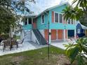 This cottage style home features two-car garage, front stairs and covered entry at 1626 27Th N Ave, St Petersburg, FL 33713