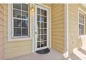 Stylish front door entrance with glass accents and a welcoming exterior at 456 Bahia Beach Blvd, Ruskin, FL 33570