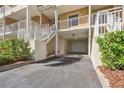 Townhome with ground-level garage and landscaped entrance at 456 Bahia Beach Blvd, Ruskin, FL 33570