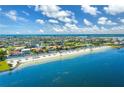 An aerial view shows white sand beaches and blue water at 6533 Channelside Dr, New Port Richey, FL 34652