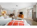 Open living area with carpet, and an adjacent bathroom at 6920 Lafayette N # 6920, Pinellas Park, FL 33781