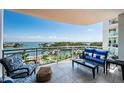 Wide balcony with comfortable seating offering beautiful views of the marina at 1325 Snell Isle Ne Blvd # 607, St Petersburg, FL 33704
