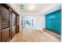 Modern lobby with a water feature, tile floors, and a clean aesthetic that welcomes residents and guests at 1325 Snell Isle Ne Blvd # 607, St Petersburg, FL 33704