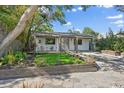 Charming home featuring a modern design with a covered porch and well-manicured landscaping at 3027 Burlington N Ave, St Petersburg, FL 33713