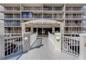 Welcoming entrance to 500 North Osceola Ave with well-maintained landscaping and architectural detail at 500 N Osceola Ave # 609, Clearwater, FL 33755
