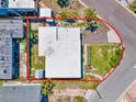 A top-down shot exhibits this property's neat landscaping, simple yard, and easy access to surrounding amenities at 13098 Boca Ciega Ave, Madeira Beach, FL 33708
