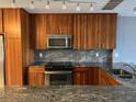 Well-equipped kitchen featuring modern appliances, granite countertops, and ample storage space at 5242 Beach Se Dr, St Petersburg, FL 33705