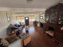 Cozy living room with hardwood floors, antique fireplace, and ornate furniture at 766 Bay Esplanade, Clearwater Beach, FL 33767