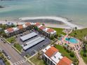Beautiful aerial view of beachfront condos with private parking and close beach access at 865 S Gulfview Blvd # 306, Clearwater Beach, FL 33767