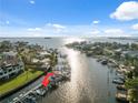 Aerial view of a waterfront property with private boat dock and stunning views of the intercoastal waterway at 2387 Hanover Dr # 2387, Dunedin, FL 34698